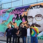 Il murales dedicato a Mario Magnotta inaugurato a Colle Sapone, firmato dall’artista Daniele Gottastia. Accanto all’opera, la figlia Romina, il sindaco Biondi e gli autori degli scherzi riuniti per celebrare il “Magnotta Day”